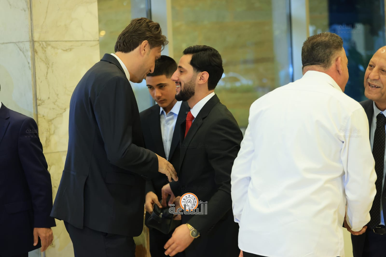 Madar Al-Saa Images 0.10005389844801071