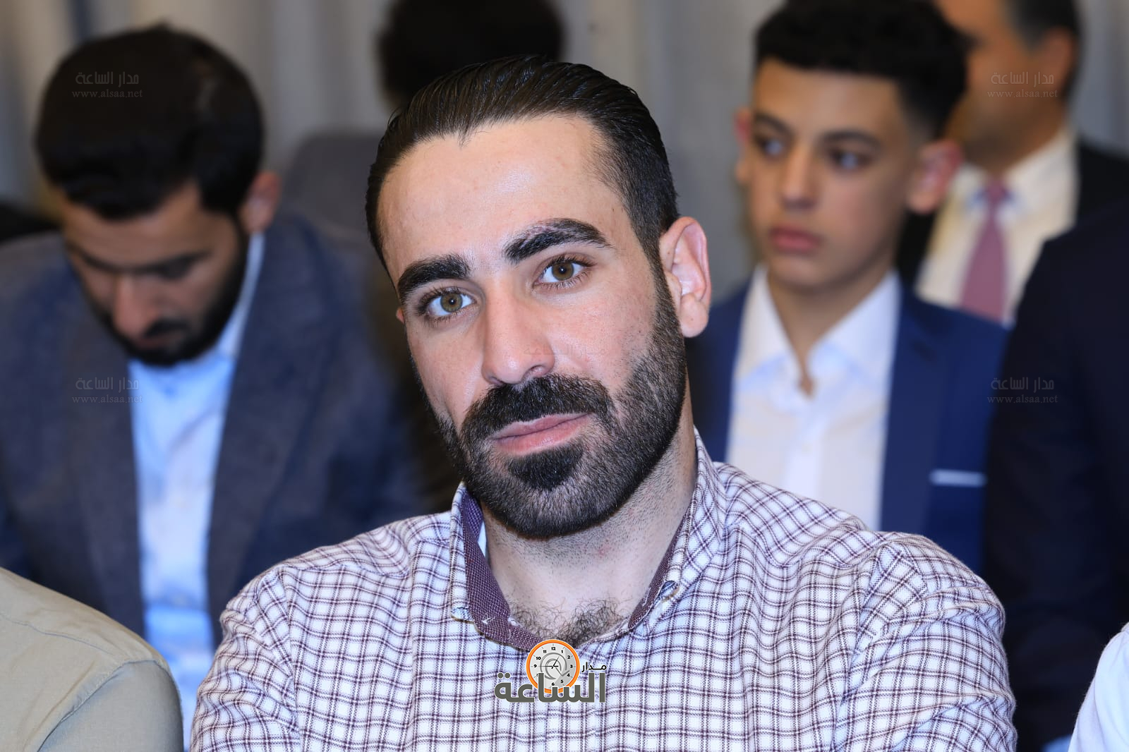 Madar Al-Saa Images 0.08132334064512137