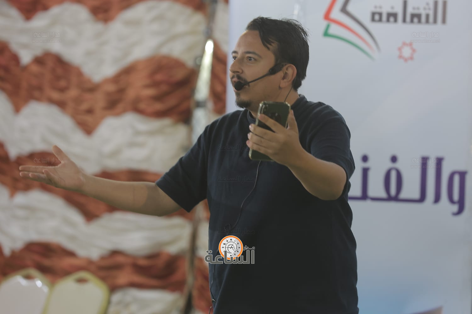 Madar Al-Saa Images 0.55918805051369