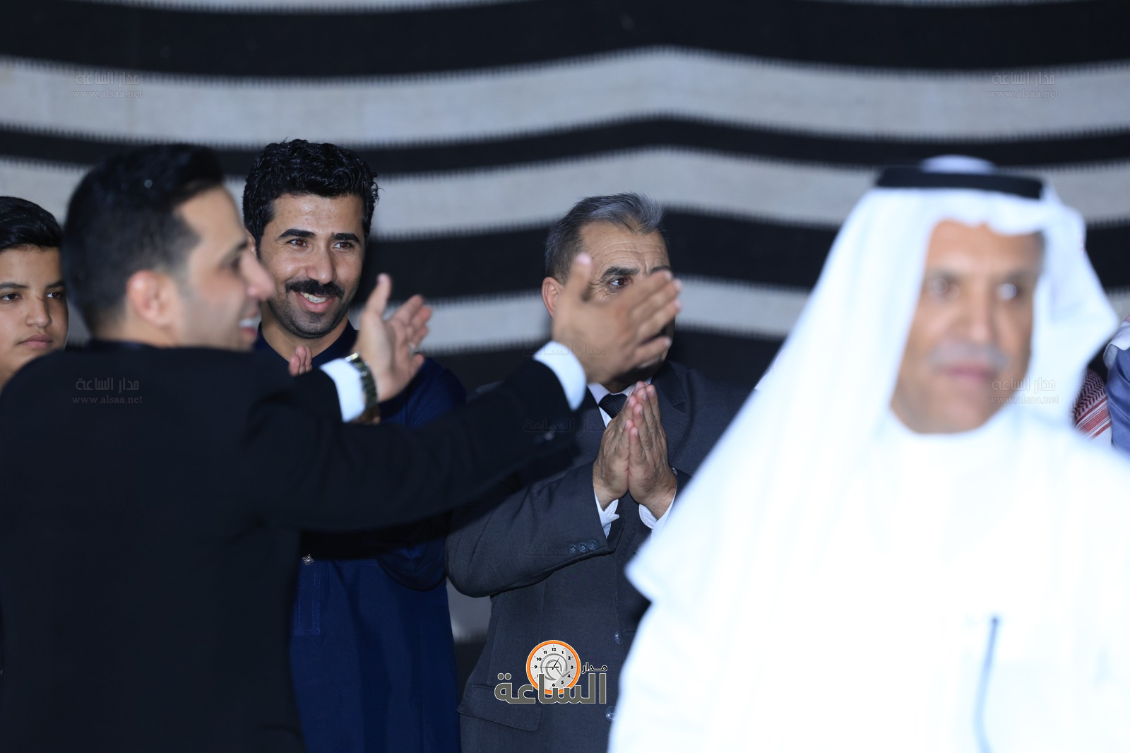 Madar Al-Saa Images 0.8739063640605275