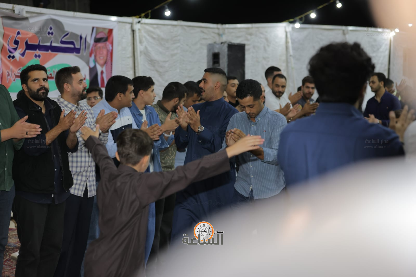 Madar Al-Saa Images 0.41660393033721377