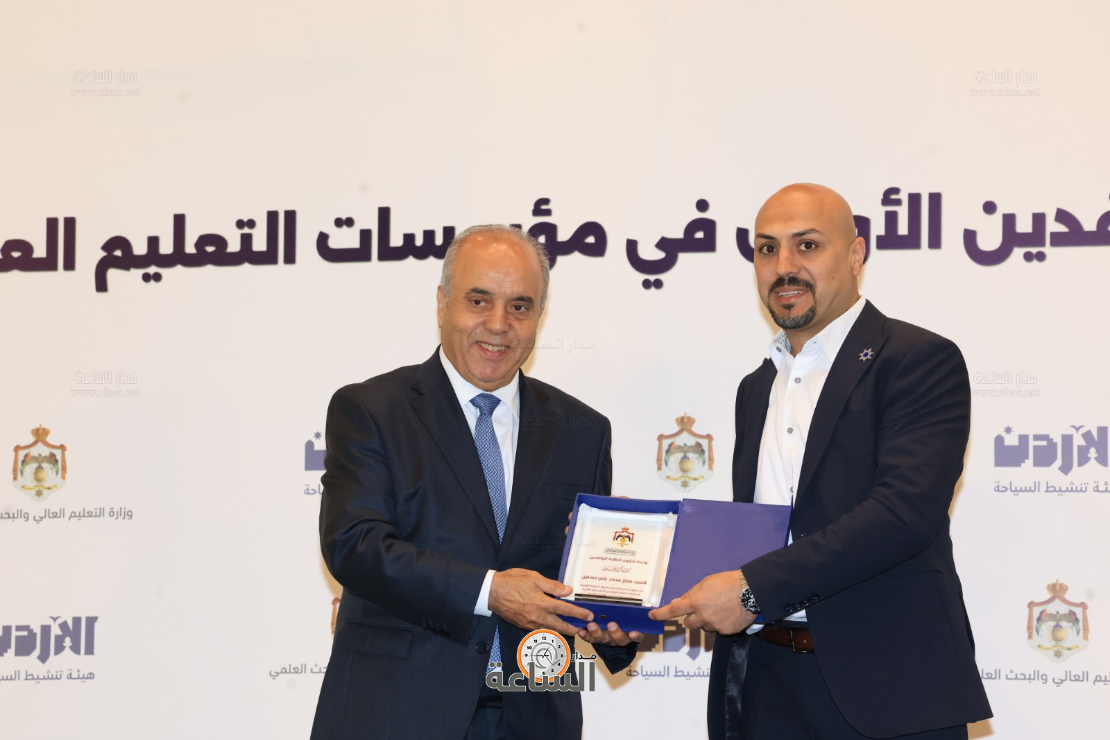 Madar Al-Saa Images 0.7571393518143051