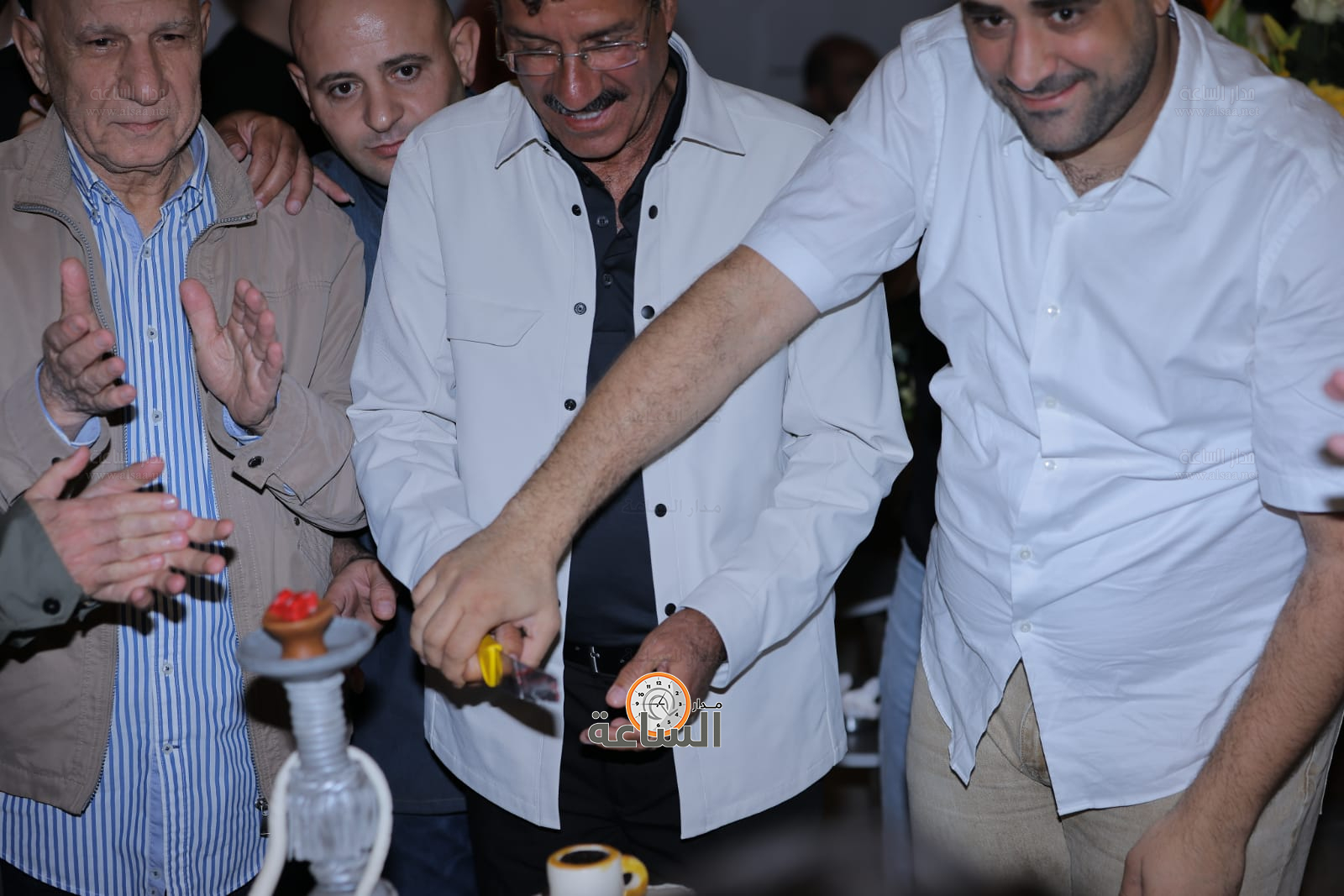 Madar Al-Saa Images 0.6681029613438326