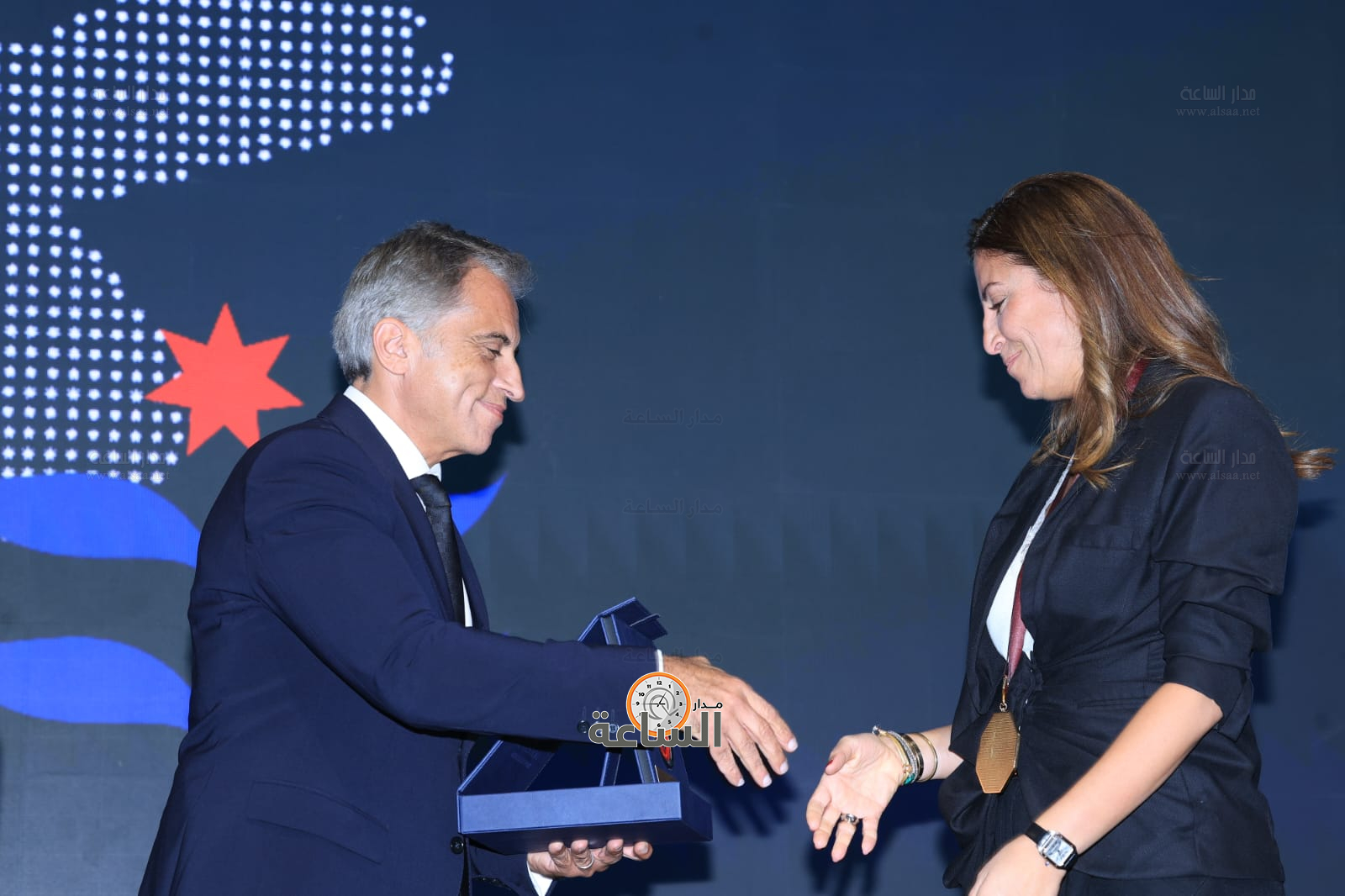 Madar Al-Saa Images 0.7384456444114704