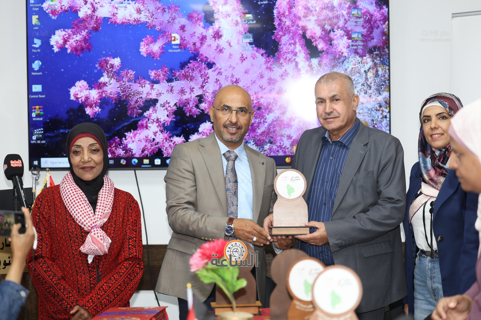 Madar Al-Saa Images 0.4409576569755017