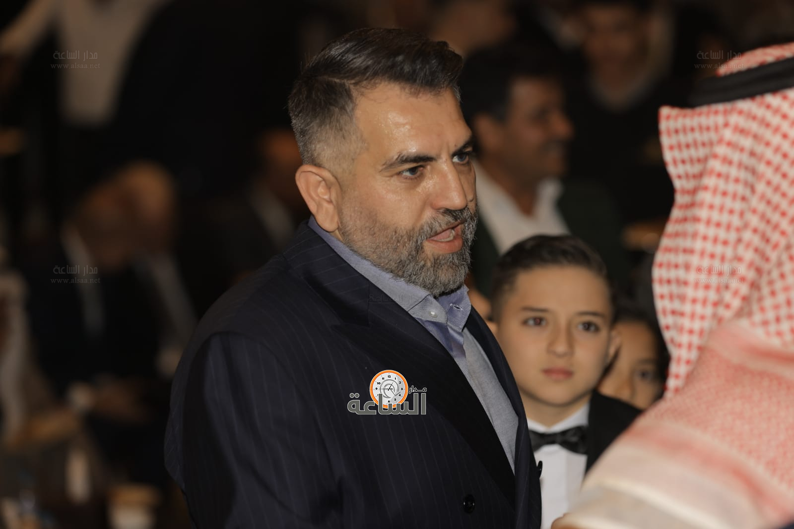 Madar Al-Saa Images 0.780799387343165