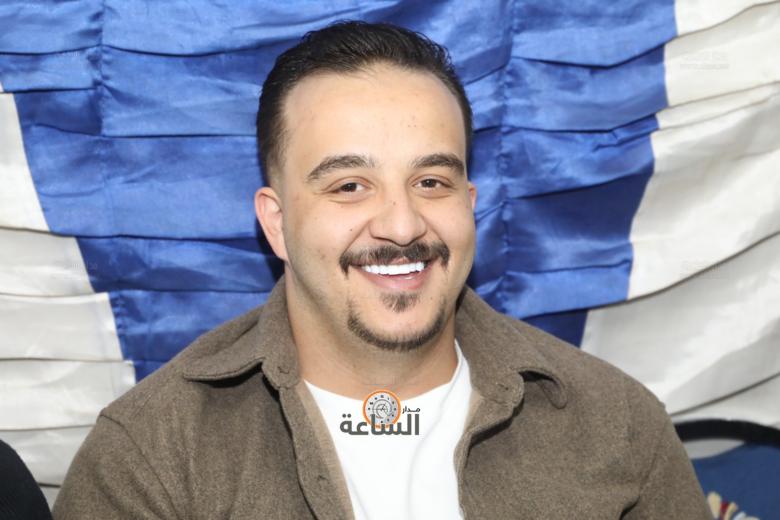 Madar Al-Saa Images 0.6268426970036975