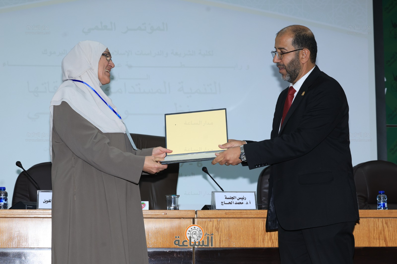 Madar Al-Saa Images 0.6376078406425917