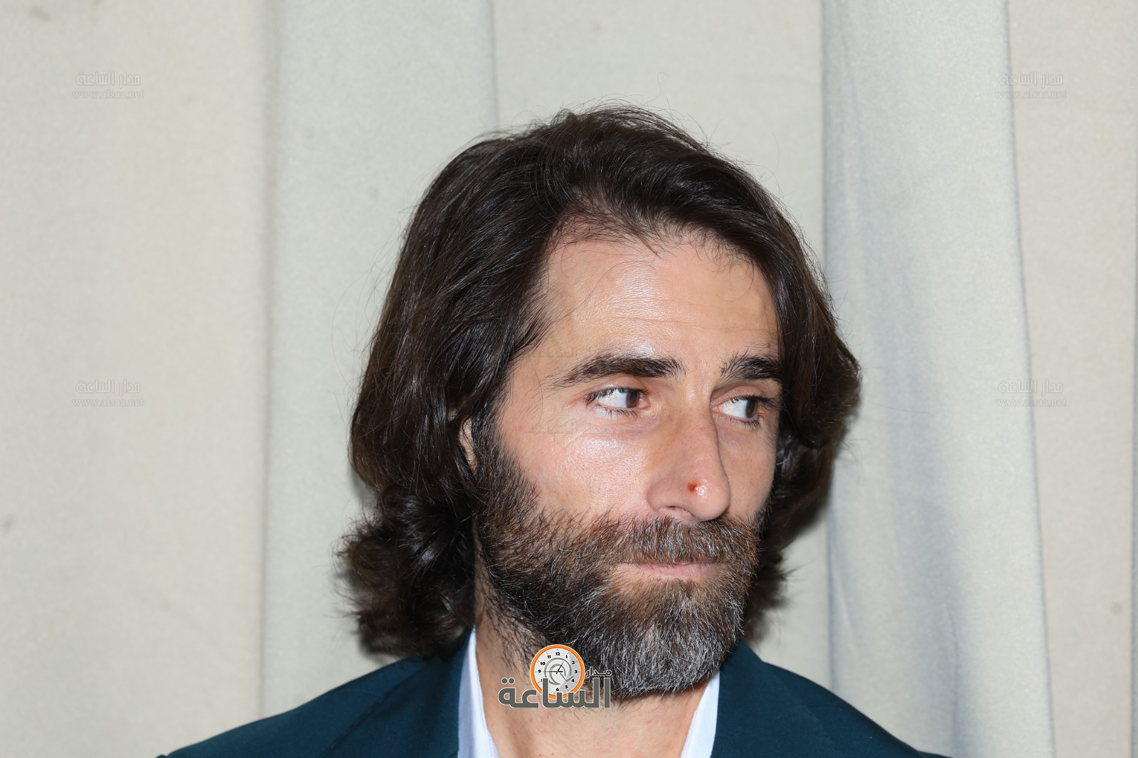 Madar Al-Saa Images 0.7795496606712983