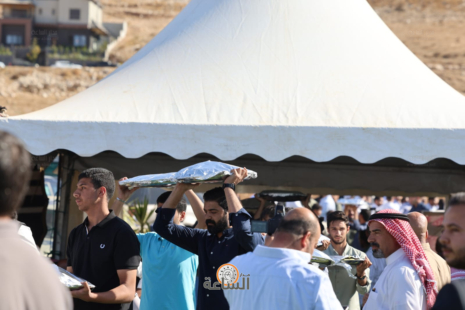 Madar Al-Saa Images 0.48722407609762897