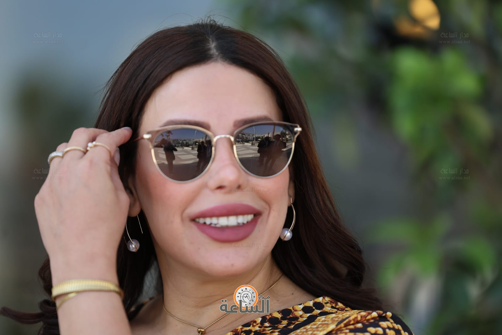 Madar Al-Saa Images 0.1327709344936887