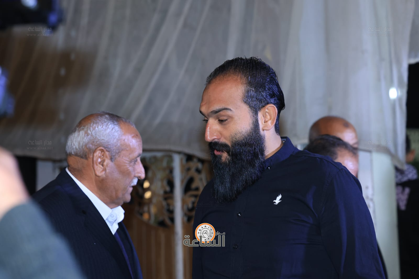 Madar Al-Saa Images 0.3299036860839196