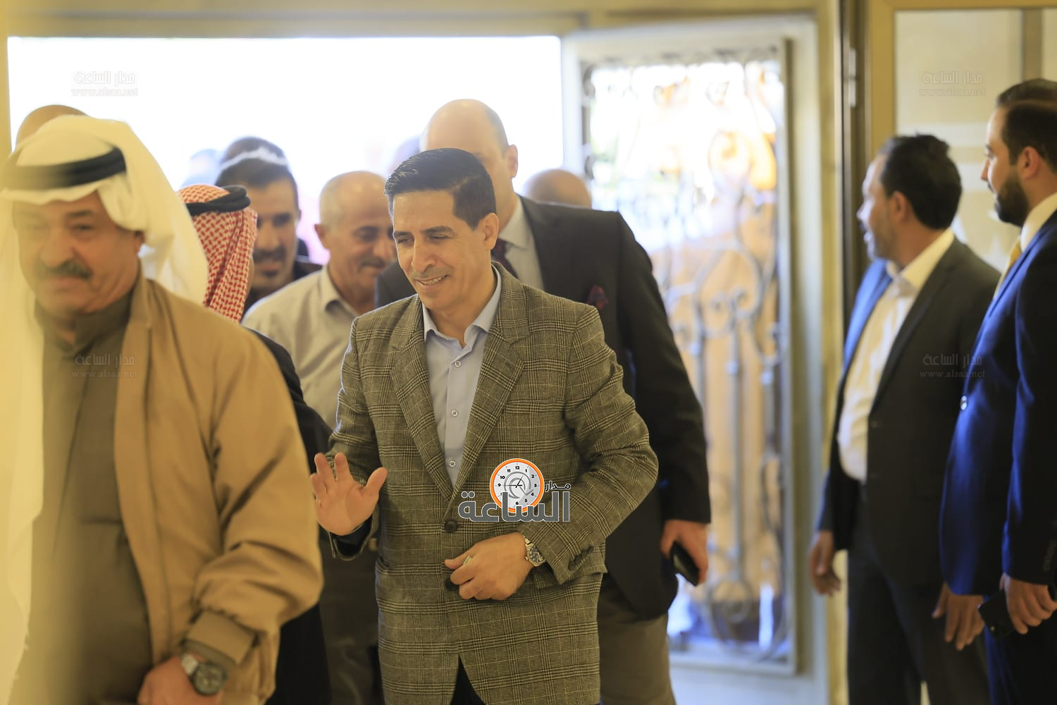 Madar Al-Saa Images 0.6564348348396469