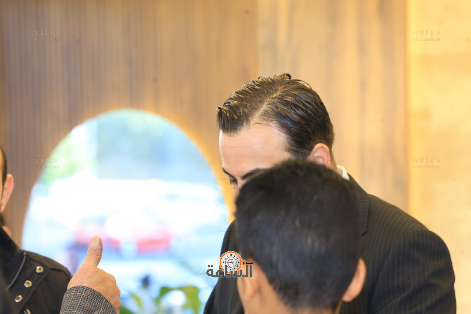 Madar Al-Saa Images 0.8924399053140708