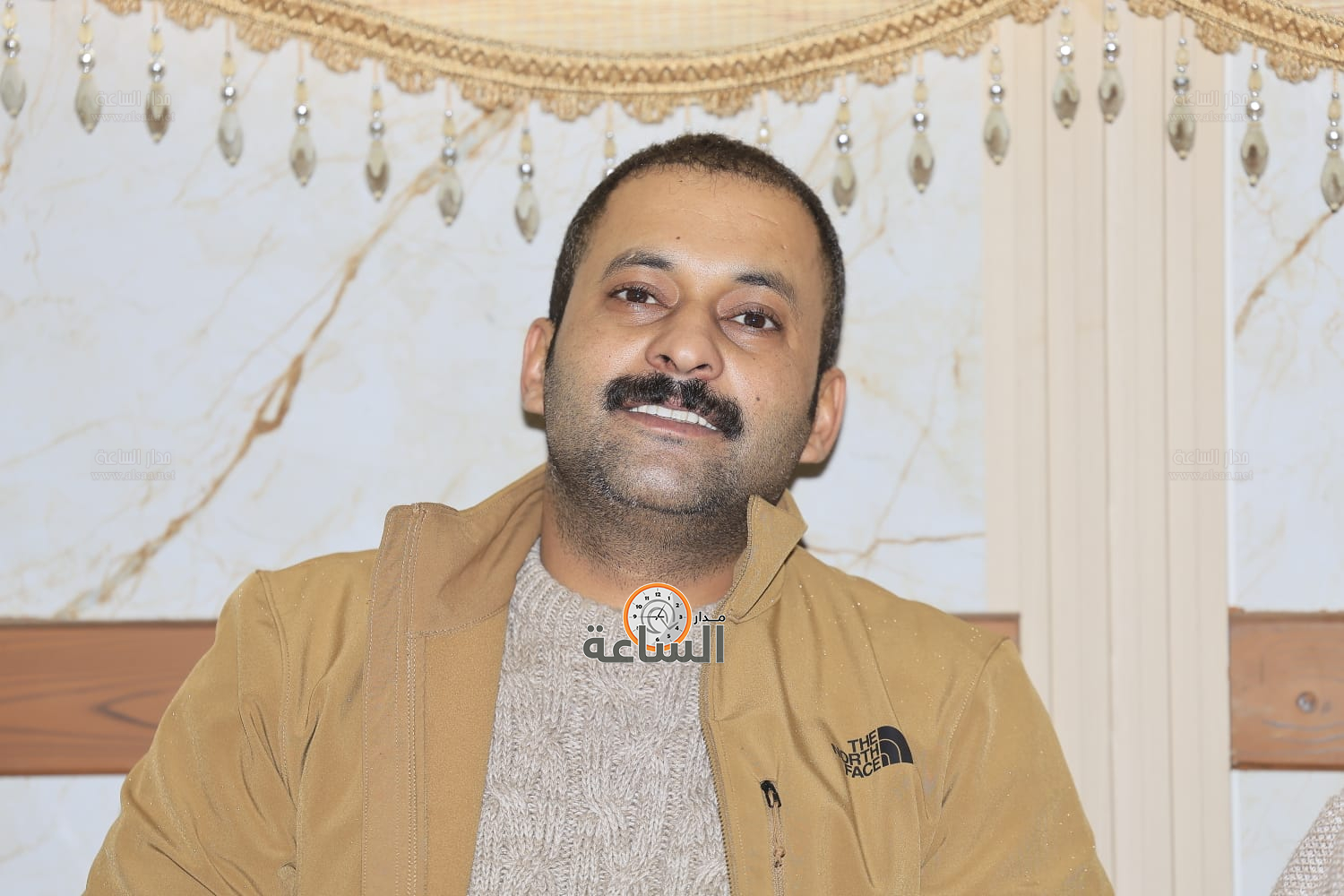 Madar Al-Saa Images 0.6242427137727214