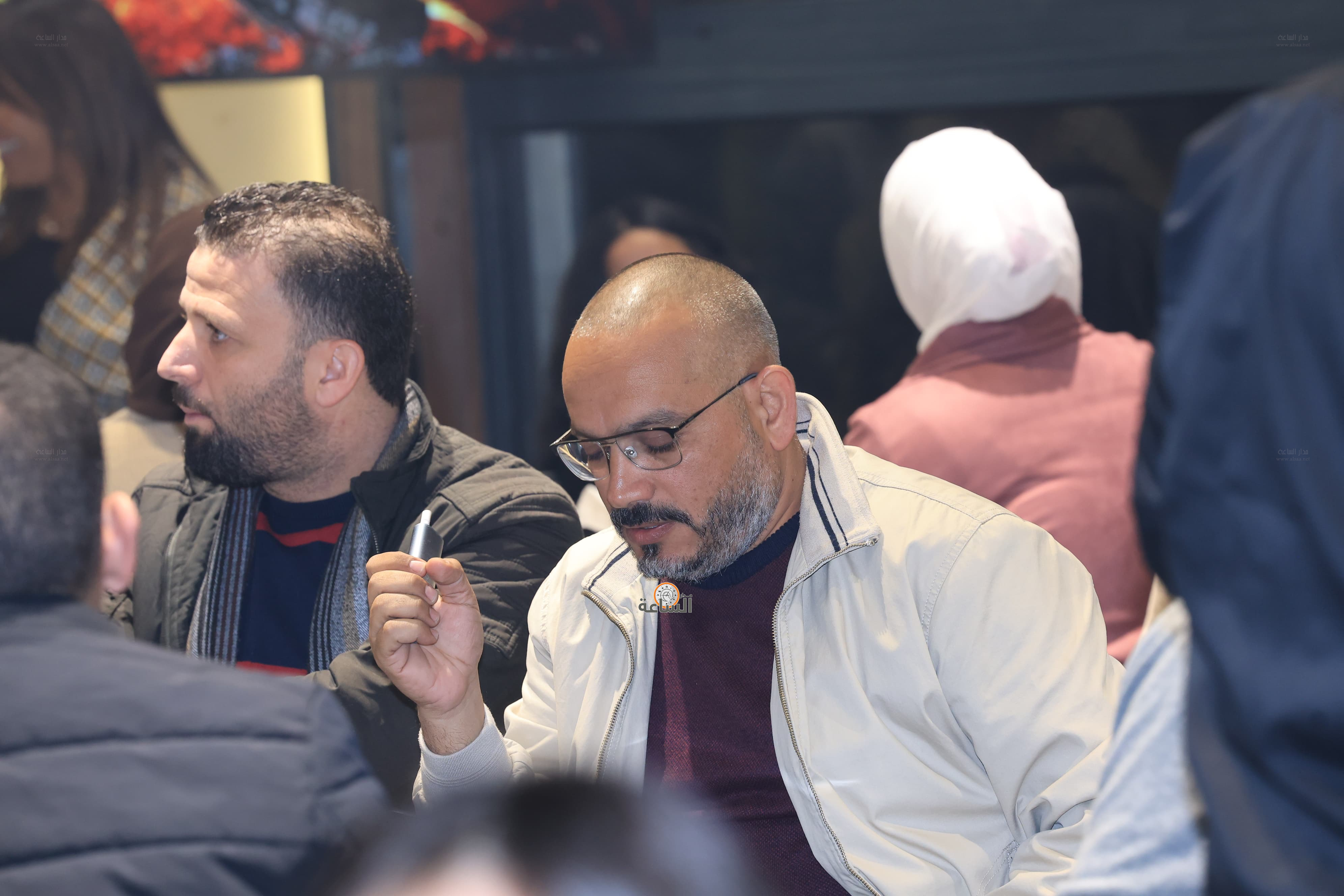 Madar Al-Saa Images 0.5904403030019607