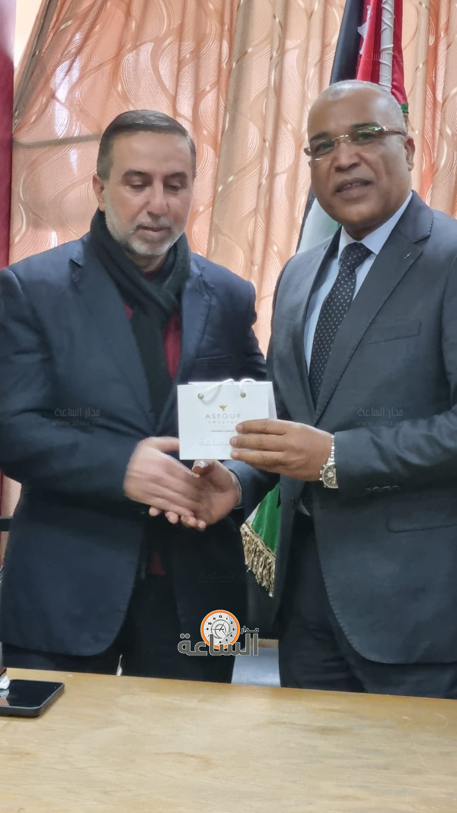 Madar Al-Saa Images 0.6786403619564967