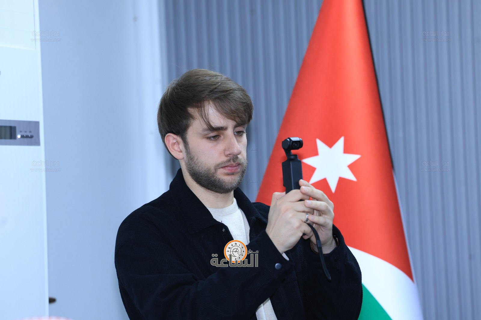 Madar Al-Saa Images 0.6856714215636469