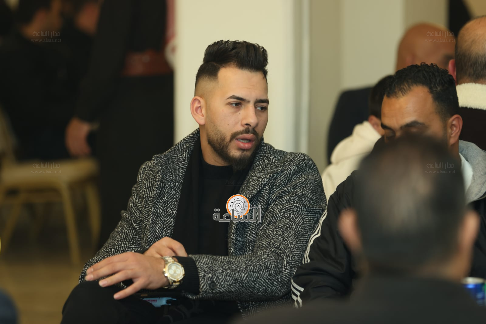 Madar Al-Saa Images 0.6364678393641214