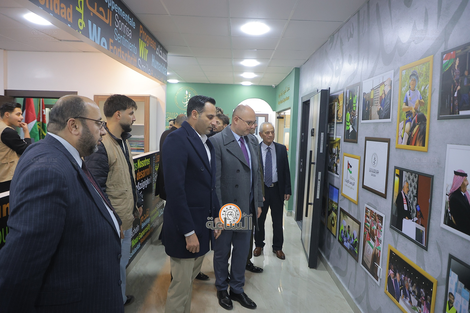 Madar Al-Saa Images 0.6314159188768047