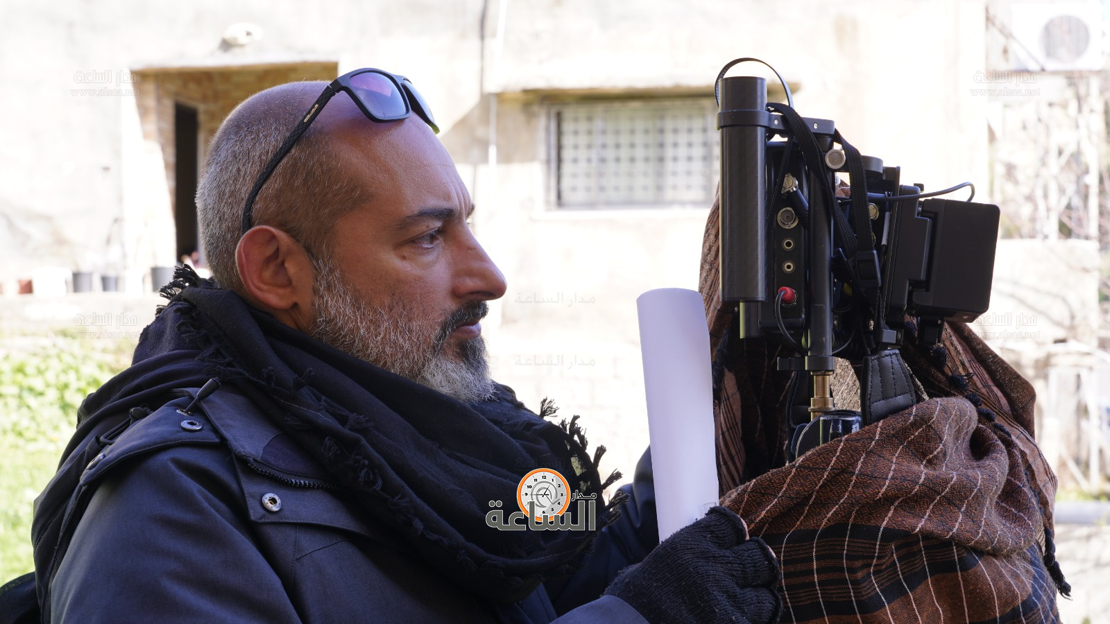 Madar Al-Saa Images 0.5925478080159491