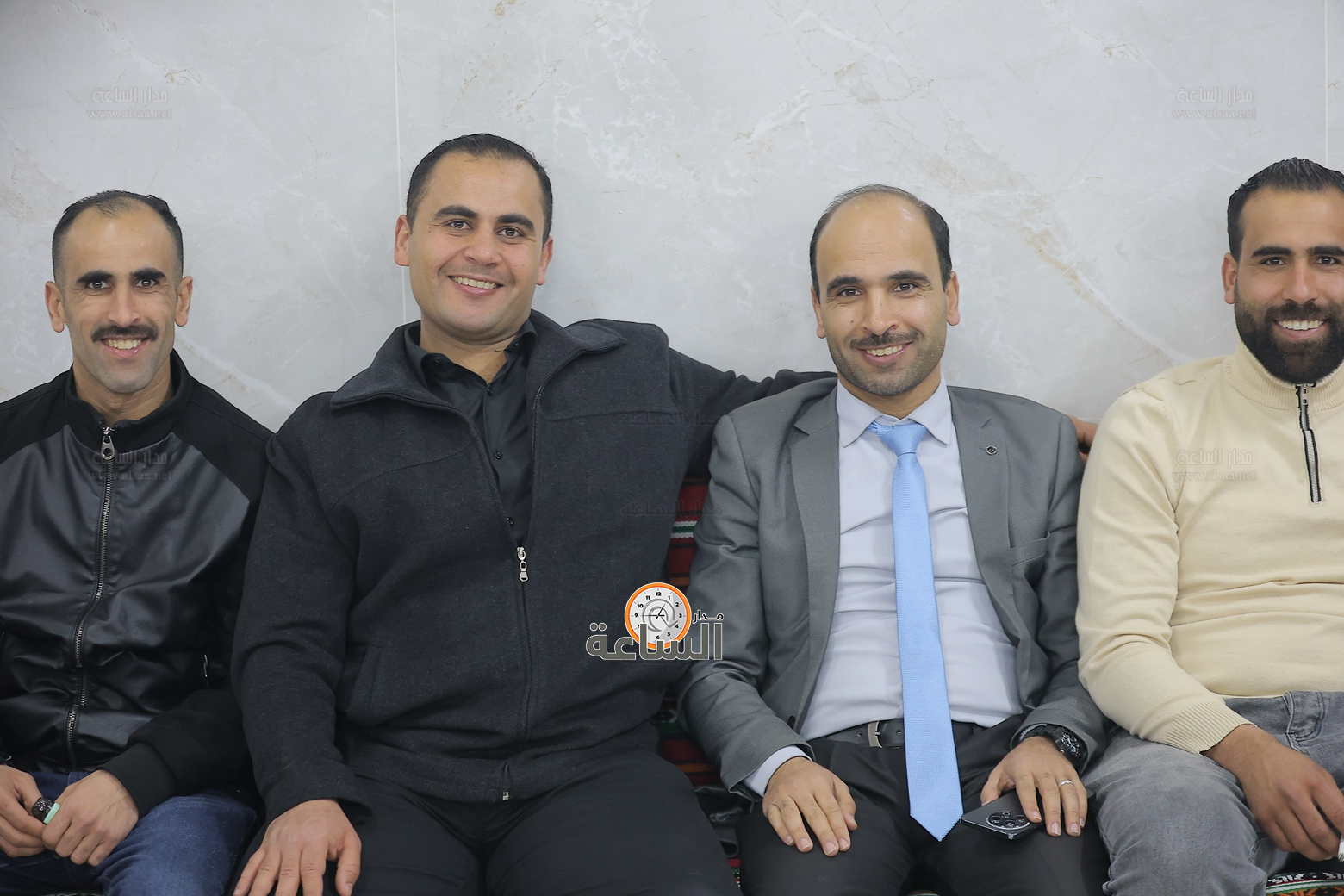 Madar Al-Saa Images 0.492342393325379