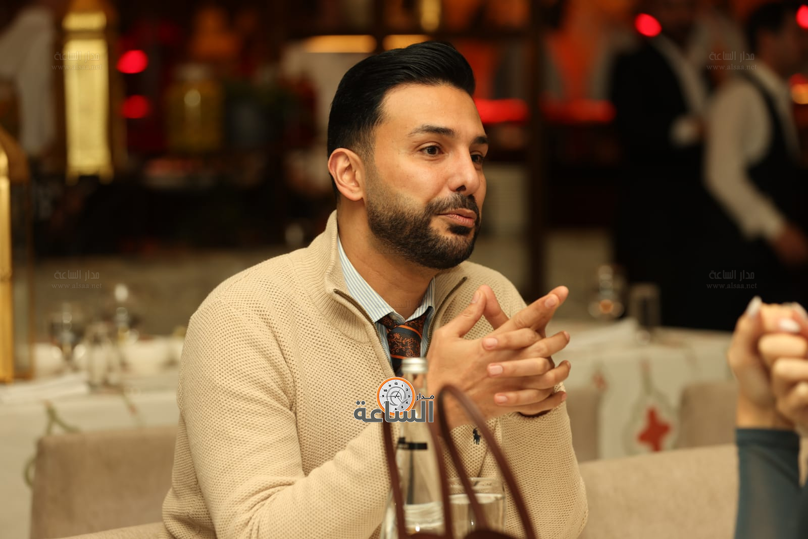 Madar Al-Saa Images 0.7130840098345709