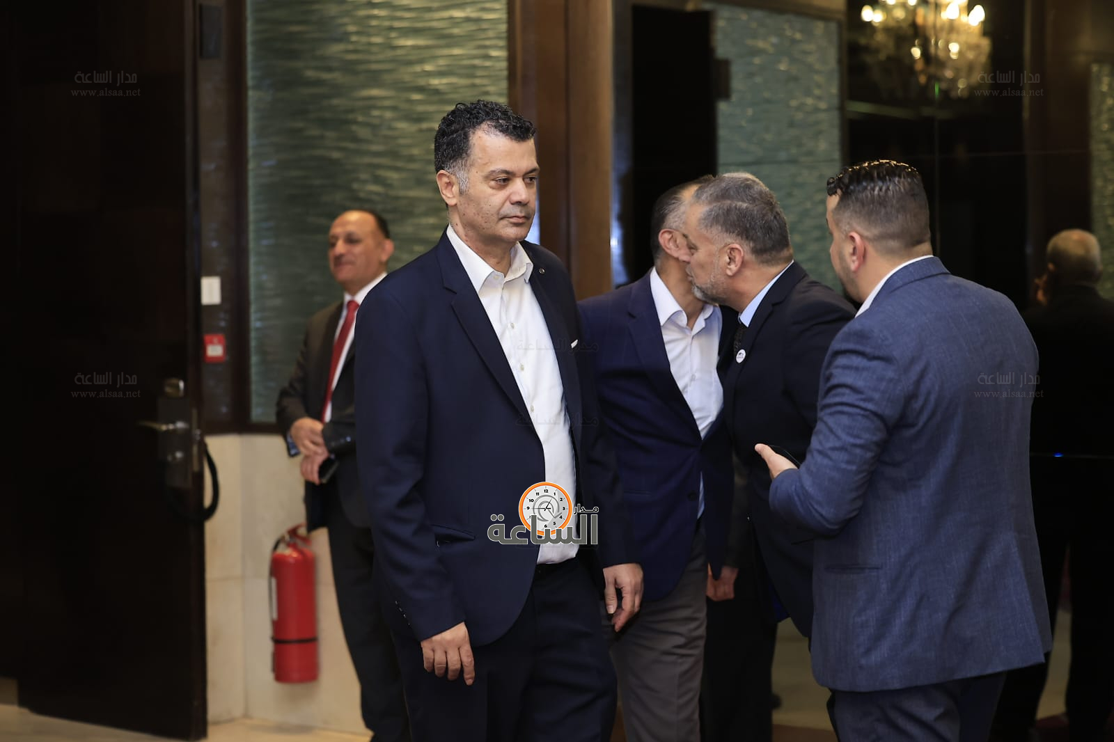 Madar Al-Saa Images 0.6008970056042343