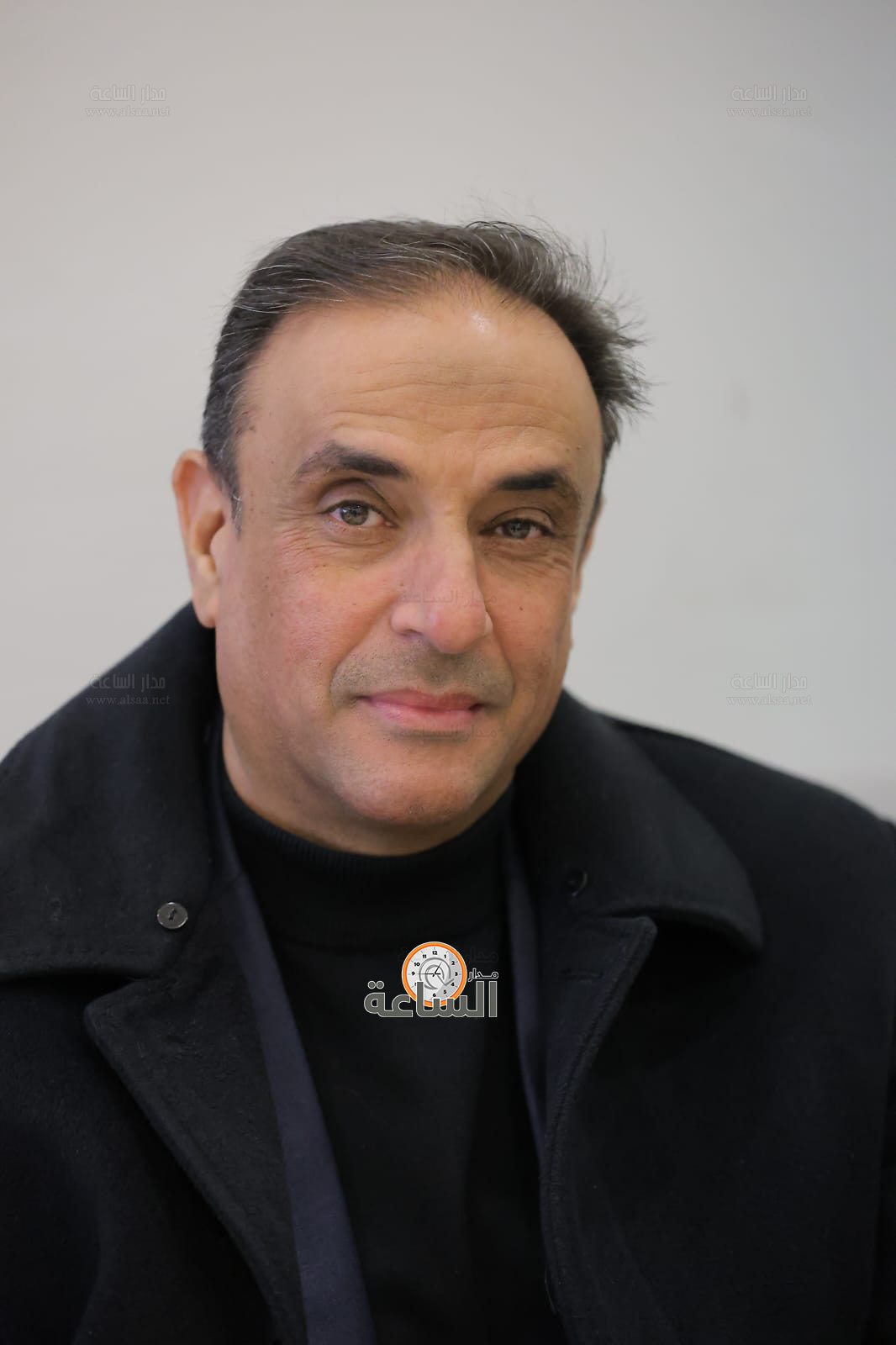 Madar Al-Saa Images 0.6932320391104411