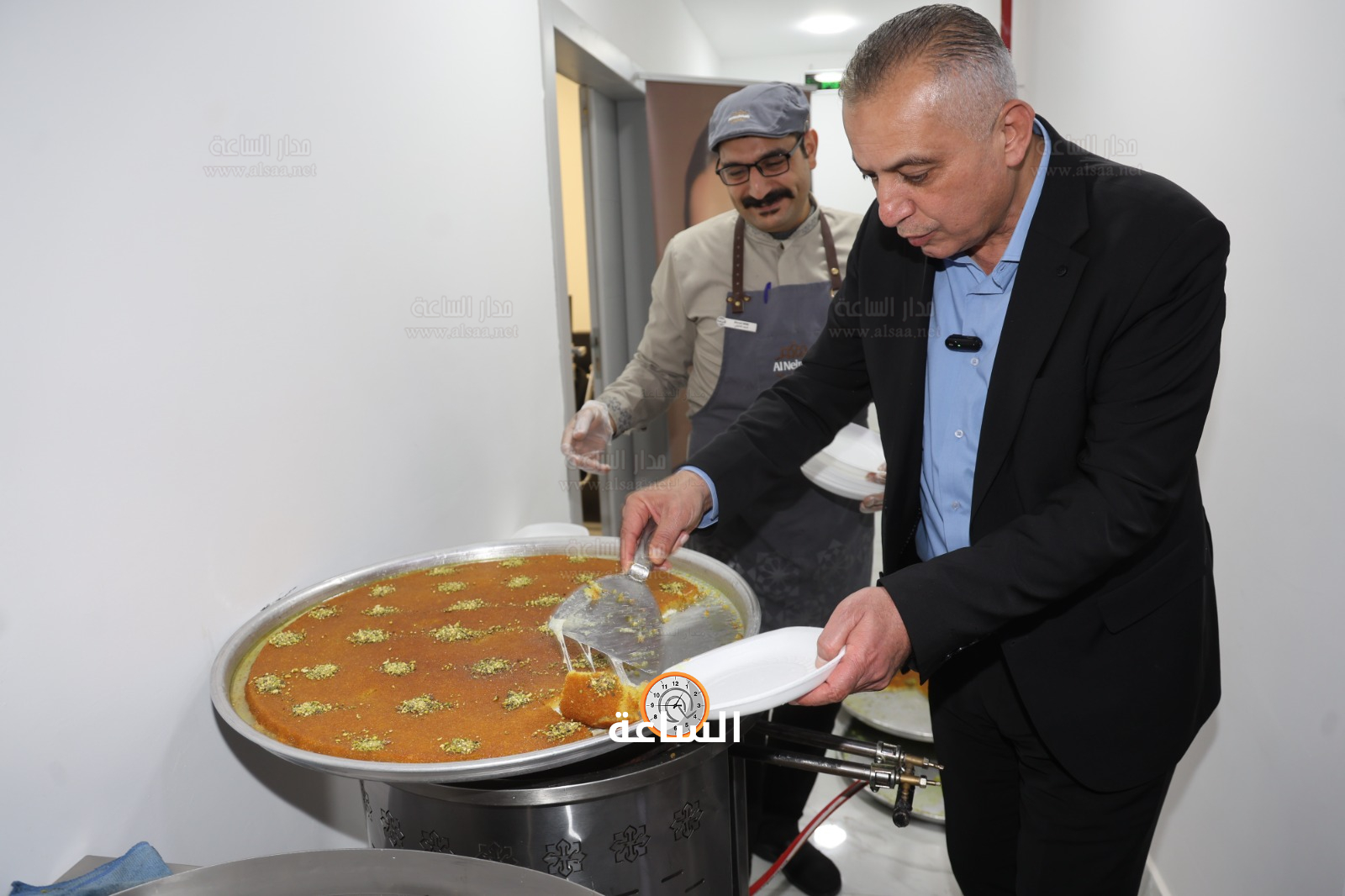 Madar Al-Saa Images 0.7493550817065754