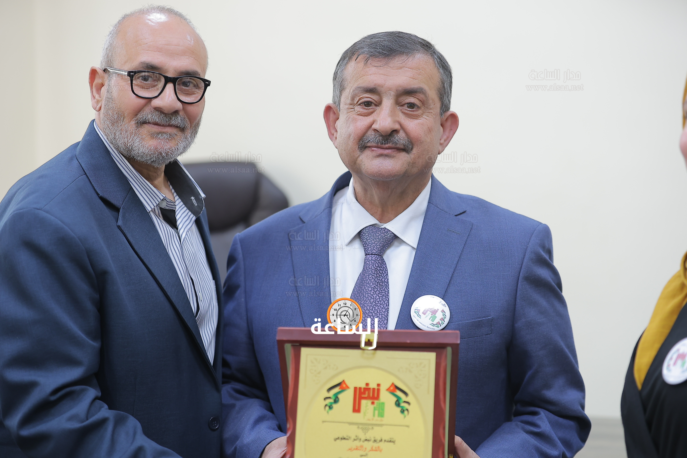 Madar Al-Saa Images 0.40102531975088485