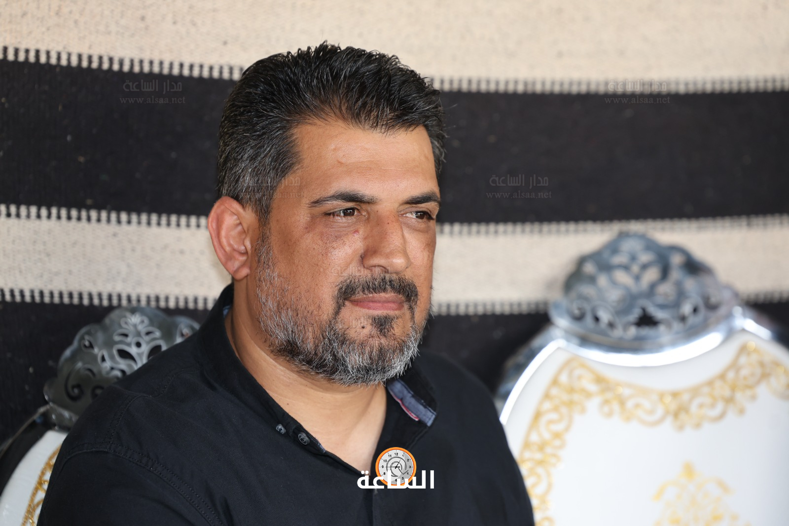 Madar Al-Saa Images 0.6558885934782216