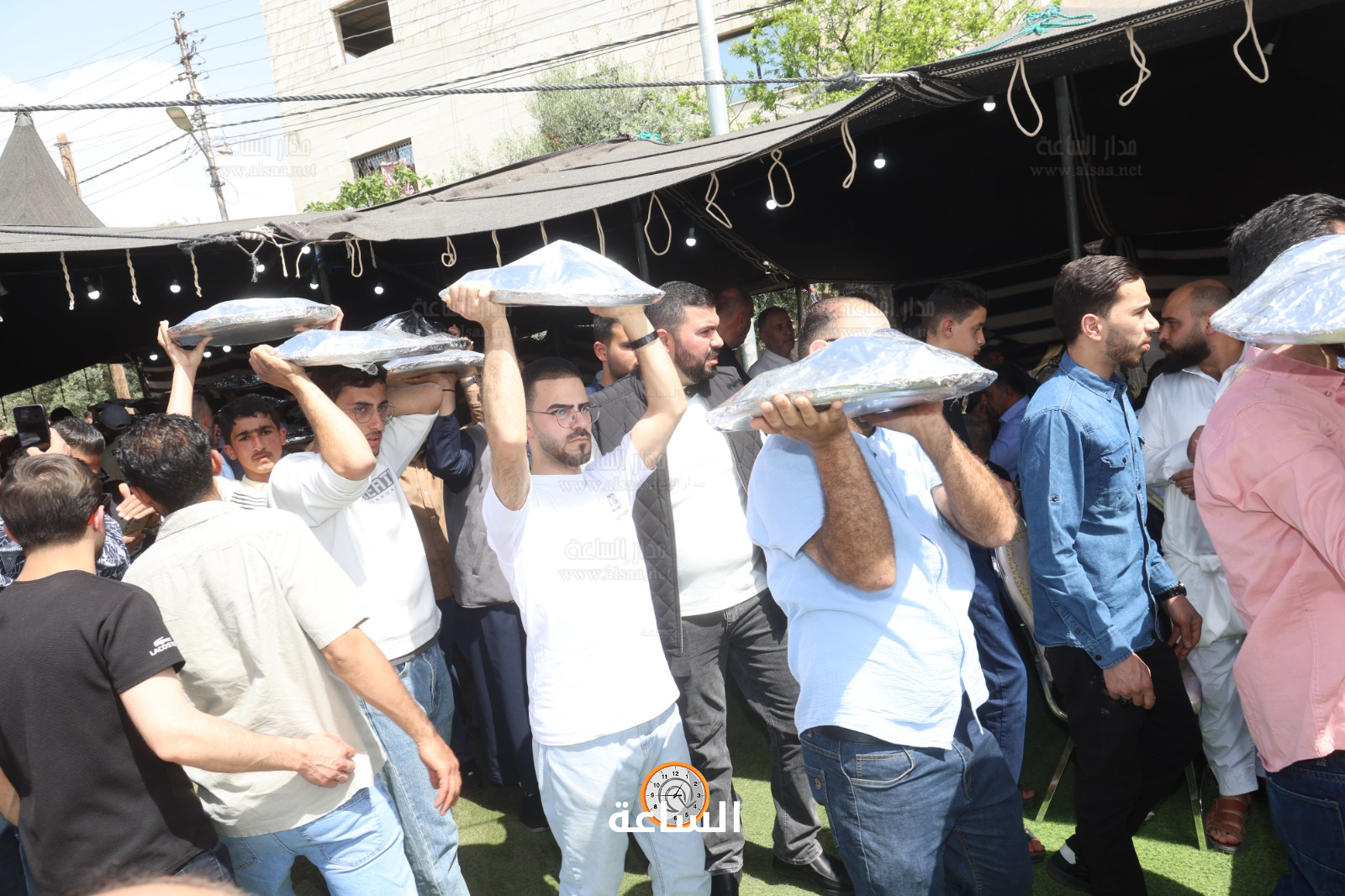 Madar Al-Saa Images 0.5796586336708441