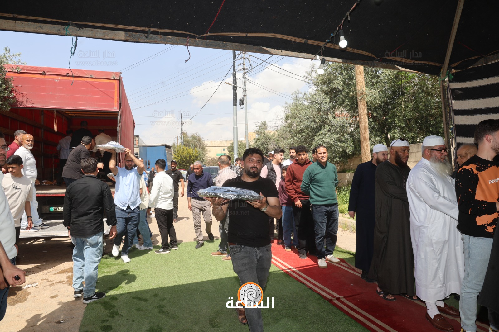 Madar Al-Saa Images 0.007126694345689244