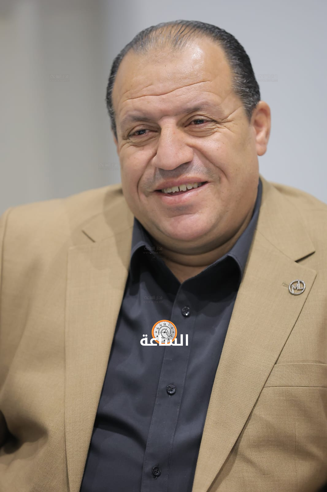 Madar Al-Saa Images 0.62315353568221