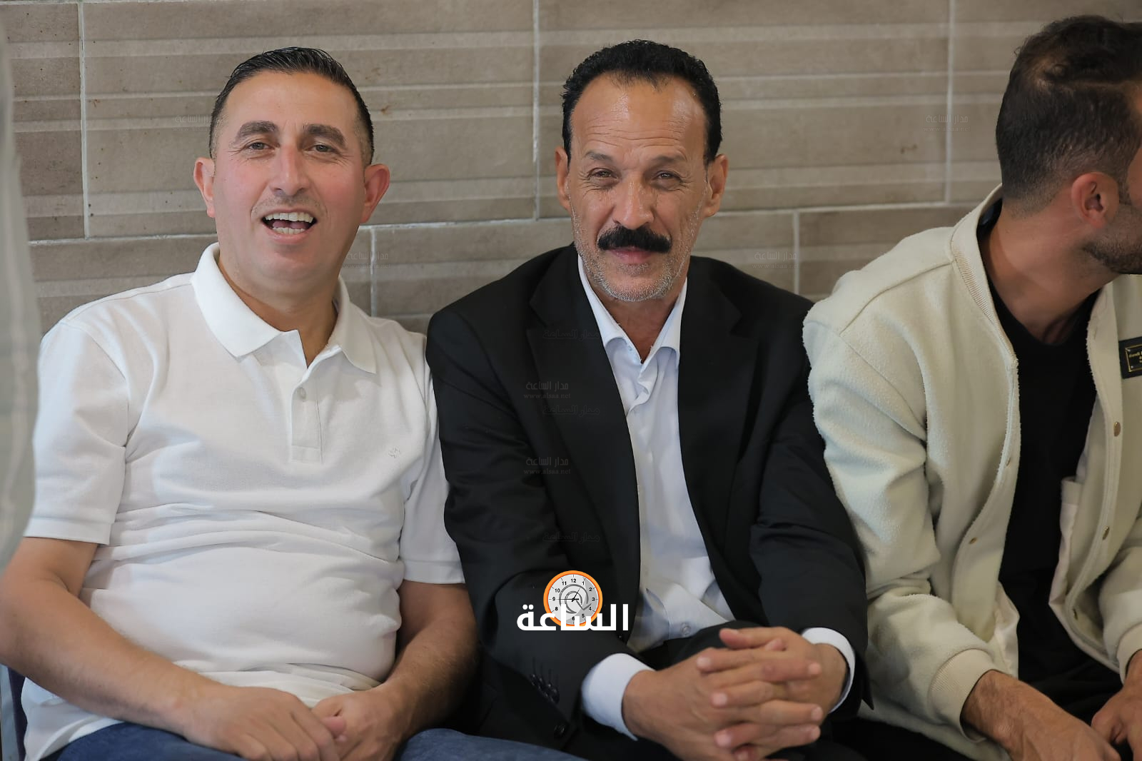 Madar Al-Saa Images 0.37086669160542685