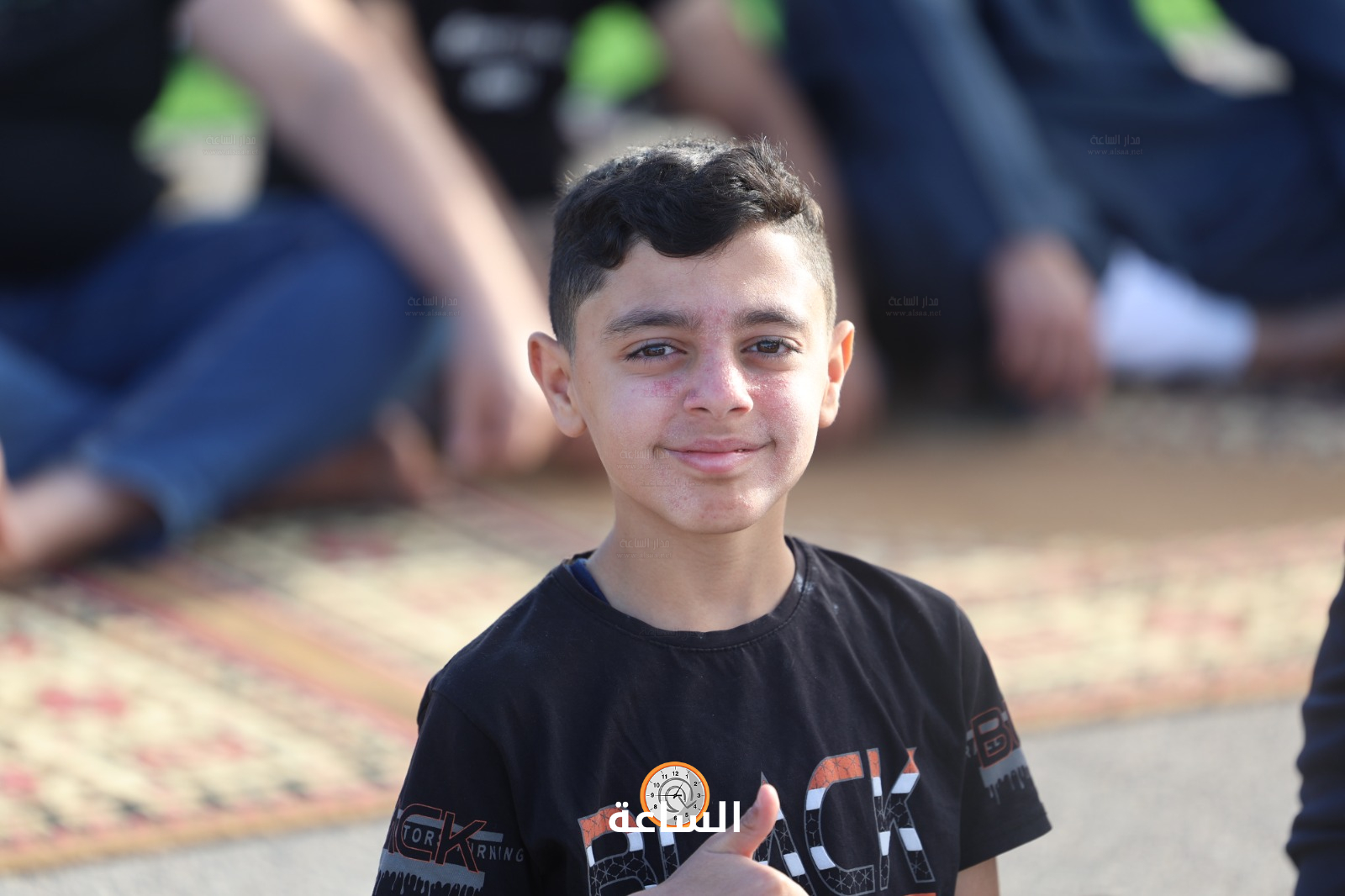 Madar Al-Saa Images 0.49852056000627987