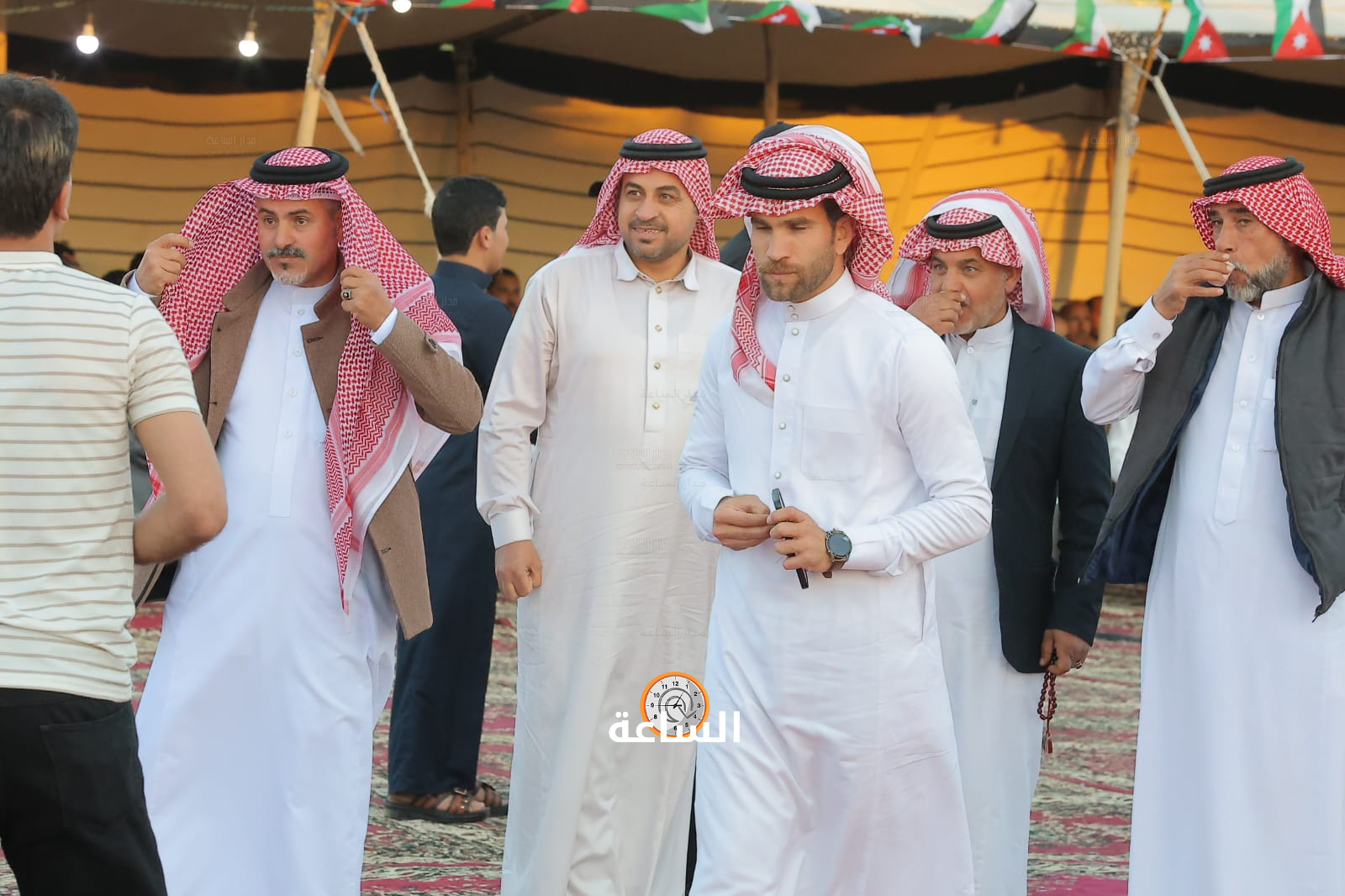 Madar Al-Saa Images 0.6191404205847972