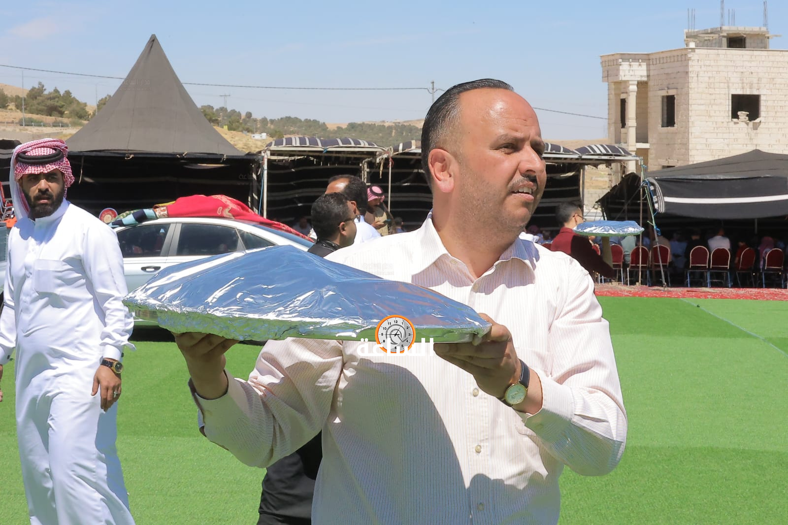 Madar Al-Saa Images 0.36274801397406864