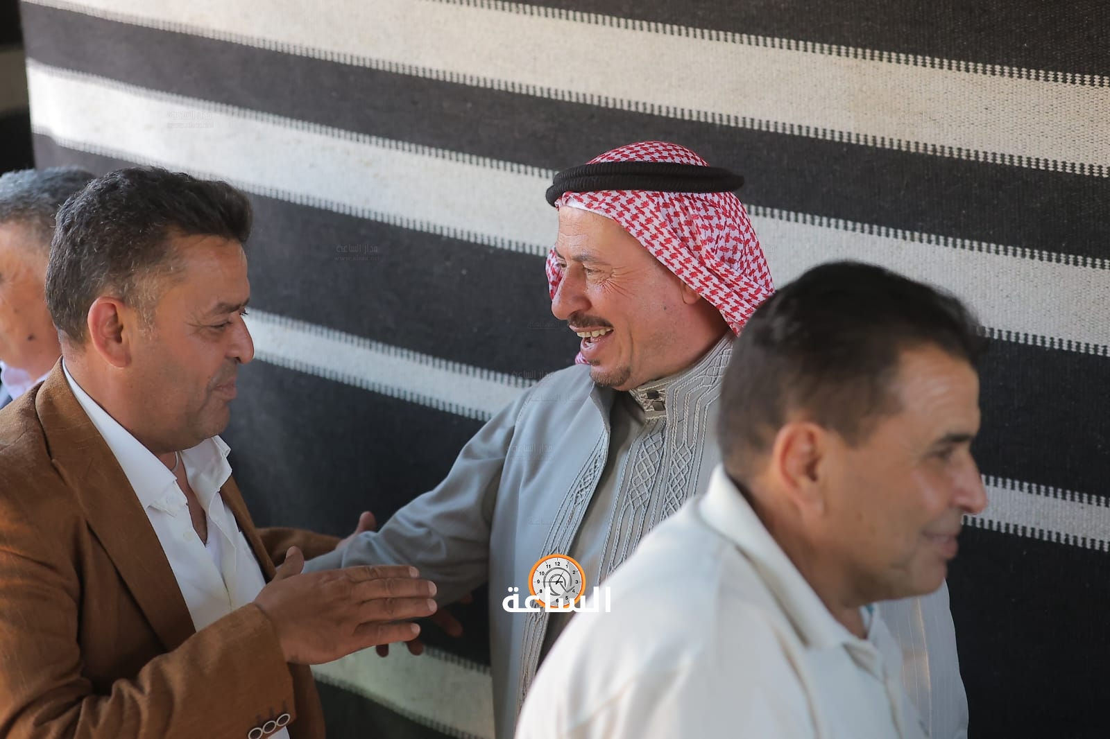 Madar Al-Saa Images 0.06498046748835928