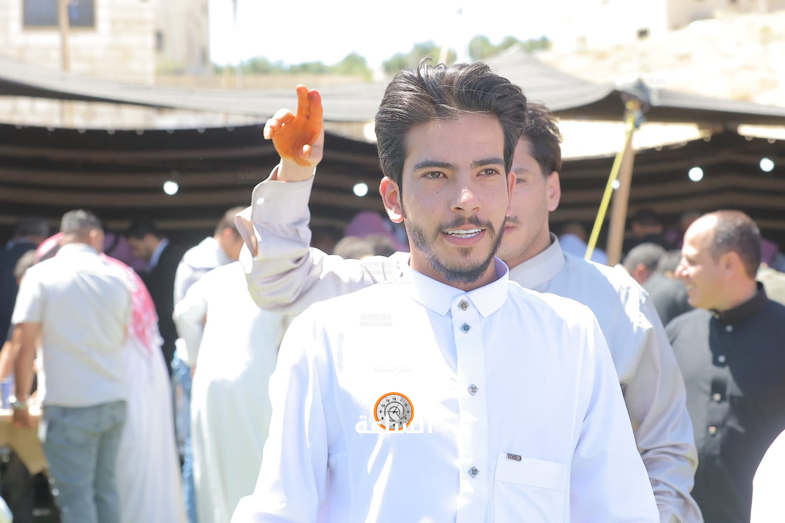 Madar Al-Saa Images 0.7178500489835622