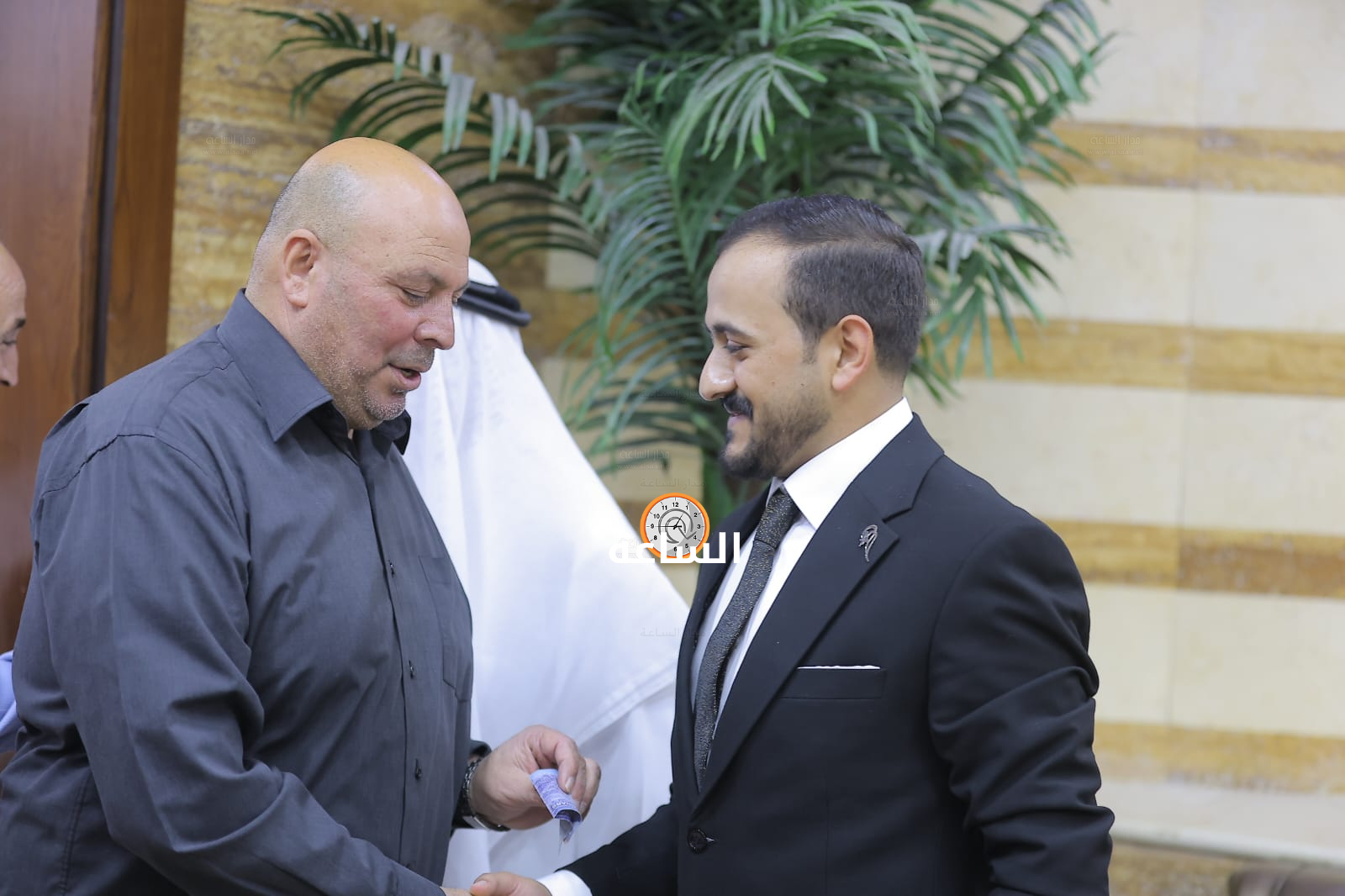 Madar Al-Saa Images 0.8877845970677234