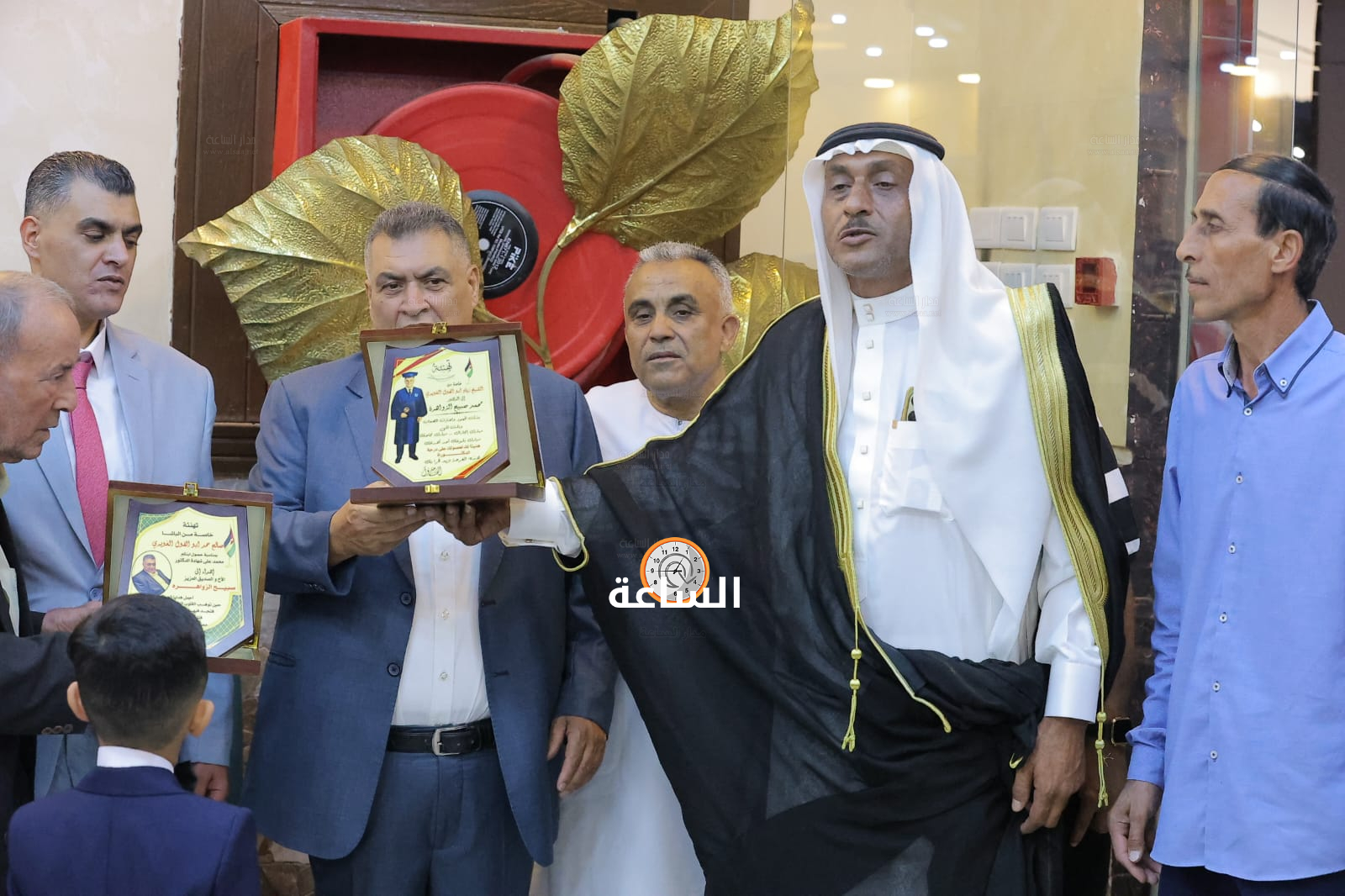 Madar Al-Saa Images 0.12498549533363512