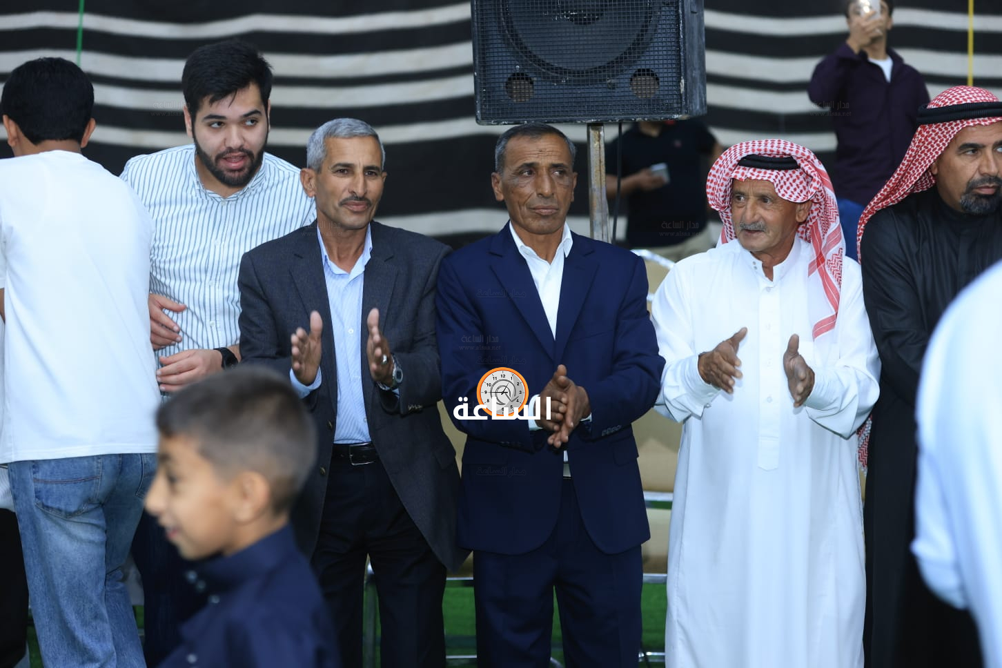 Madar Al-Saa Images 0.9799766999177723