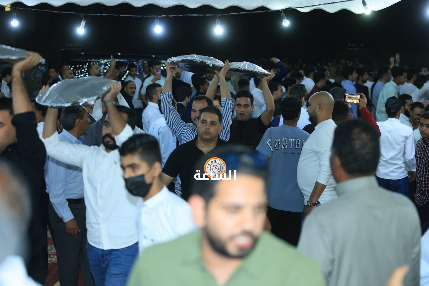 Madar Al-Saa Images 0.49373196392496554