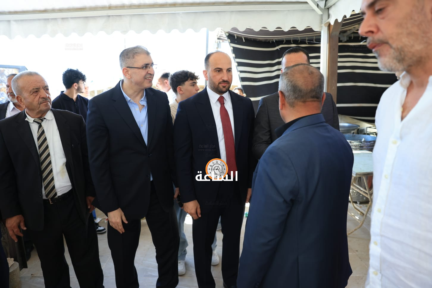 Madar Al-Saa Images 0.32649789035676036