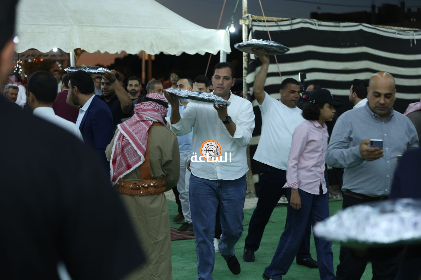 Madar Al-Saa Images 0.40844117525017354