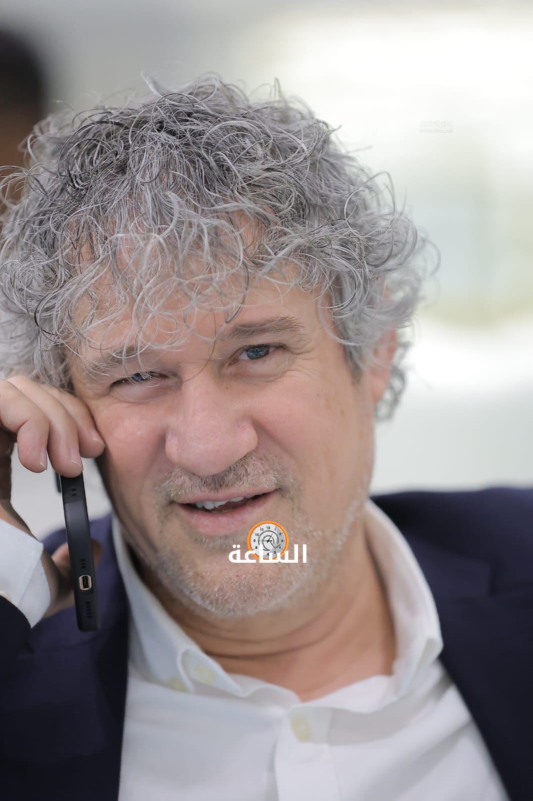 Madar Al-Saa Images 0.4758759361000551