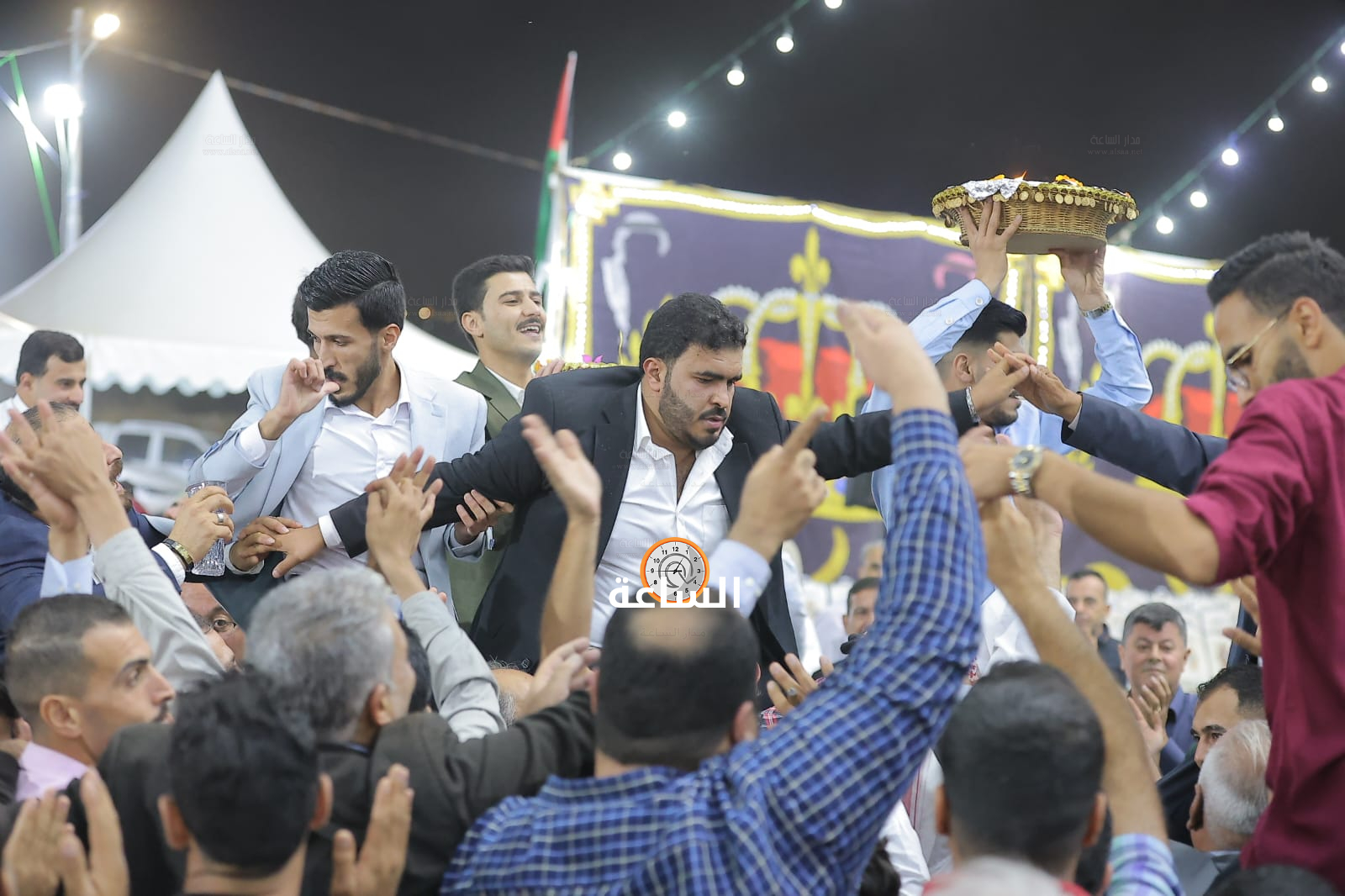 Madar Al-Saa Images 0.41865393234144