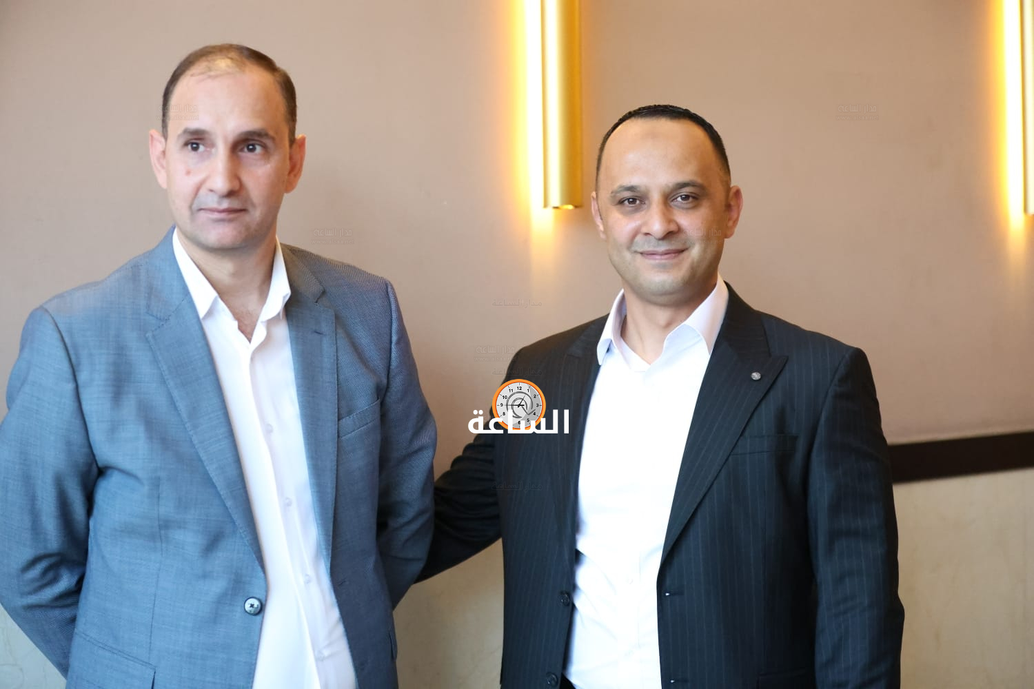 Madar Al-Saa Images 0.46769396652364237